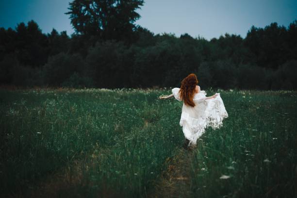 istock Girl in the field 1736030101
