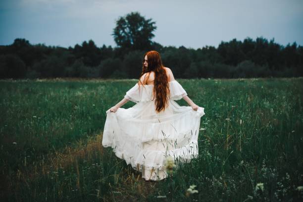 istock Girl in the field 1736030106