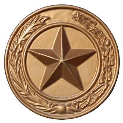 State seal of Texas in bronze saved with clipping path.Captured in front of the state capitol.