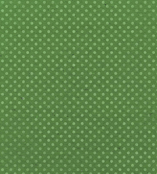 Libro verde con descolorido puntos - foto de stock