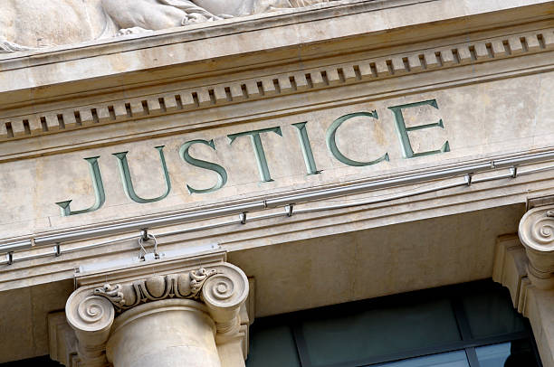 Justice sign Justice sign on a Law Courts building.  New high resolution version shown below: courtroom stock pictures, royalty-free photos & images