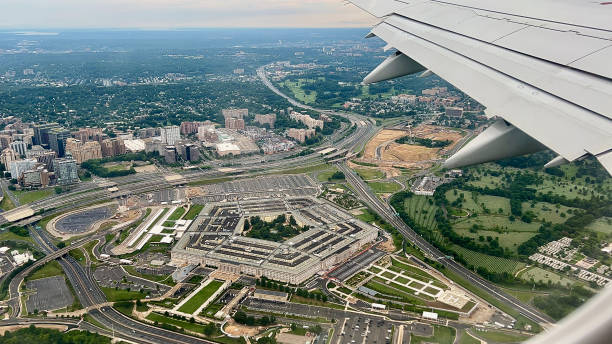 Aerial view of the US Department of Defense and Arlington Cemetery under the wing. The Pentagon pentagon stock pictures, royalty-free photos & images