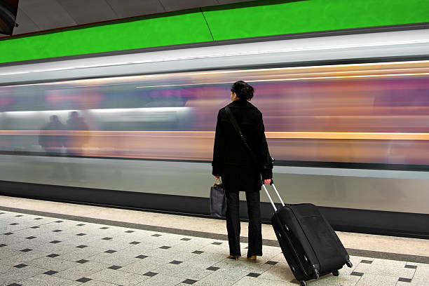 istock young woman waiting for the subway 173604534