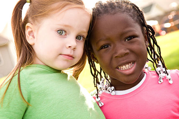 istock Two Little Girls Together Outside 173605211