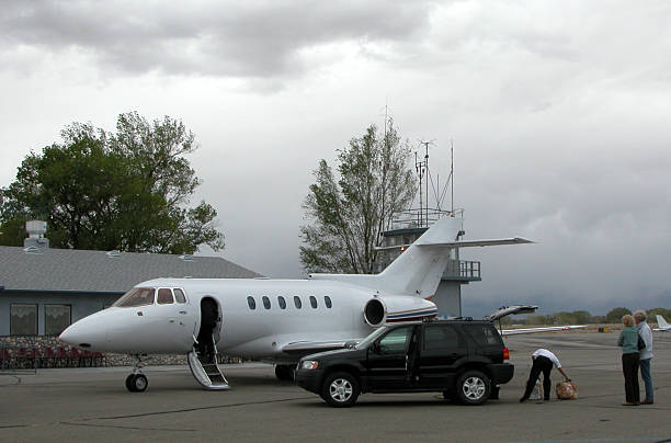 Charter Jet & Passengers stock photo
