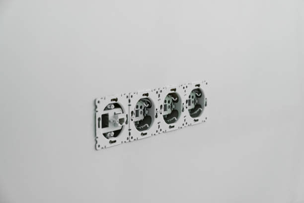istock Electrical sockets with wiring on wall, closeup 1736055058