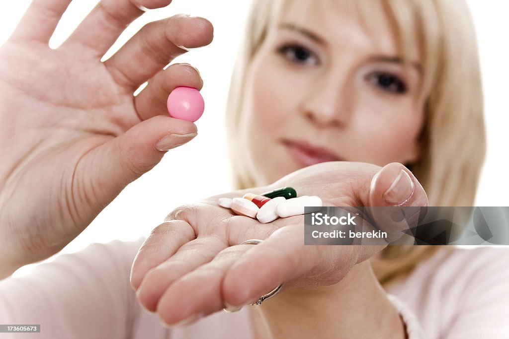 Mulheres jovens com comprimidos em mãos - Foto de stock de Adulto royalty-free