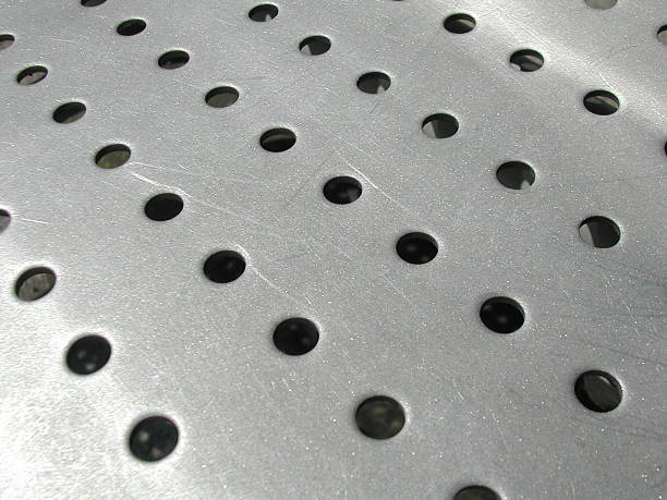 istock Holes in Sheet Metal 173605730