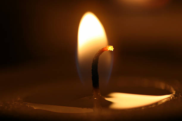 Single candle stock photo