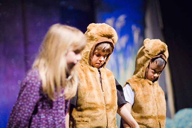 Preschool Theater Play Preschool age kids performing in a theater play. mm1 stock pictures, royalty-free photos & images