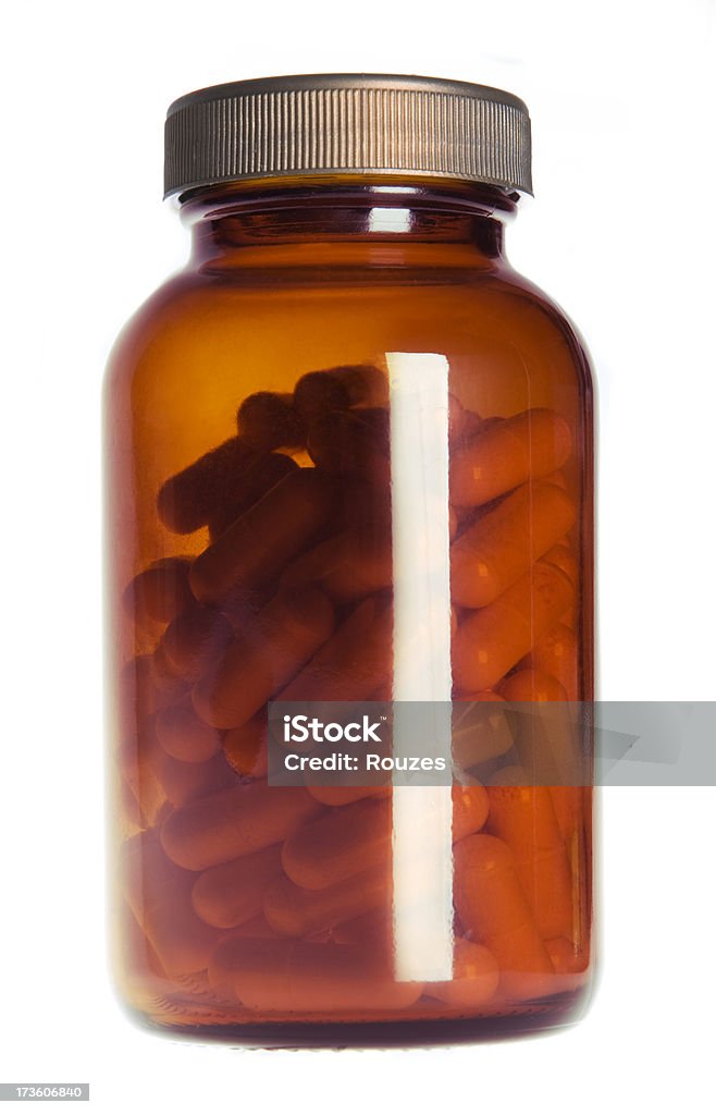 Píldoras en frasco de orange - Foto de stock de Asistencia sanitaria y medicina libre de derechos