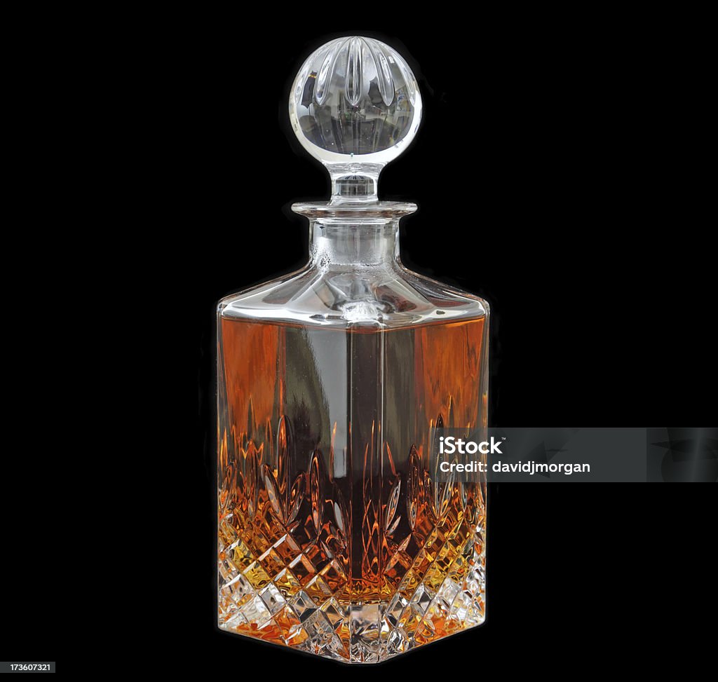 Crystal decanter empty Crystal decanter filled with whiskey on a black background Decanter Stock Photo