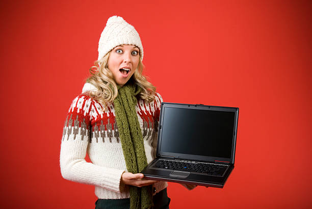 istock Suprised Woman With Laptop Computer For Christmas 173607420