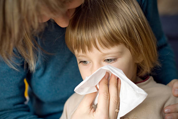 istock Mother and a sick girl 173608308