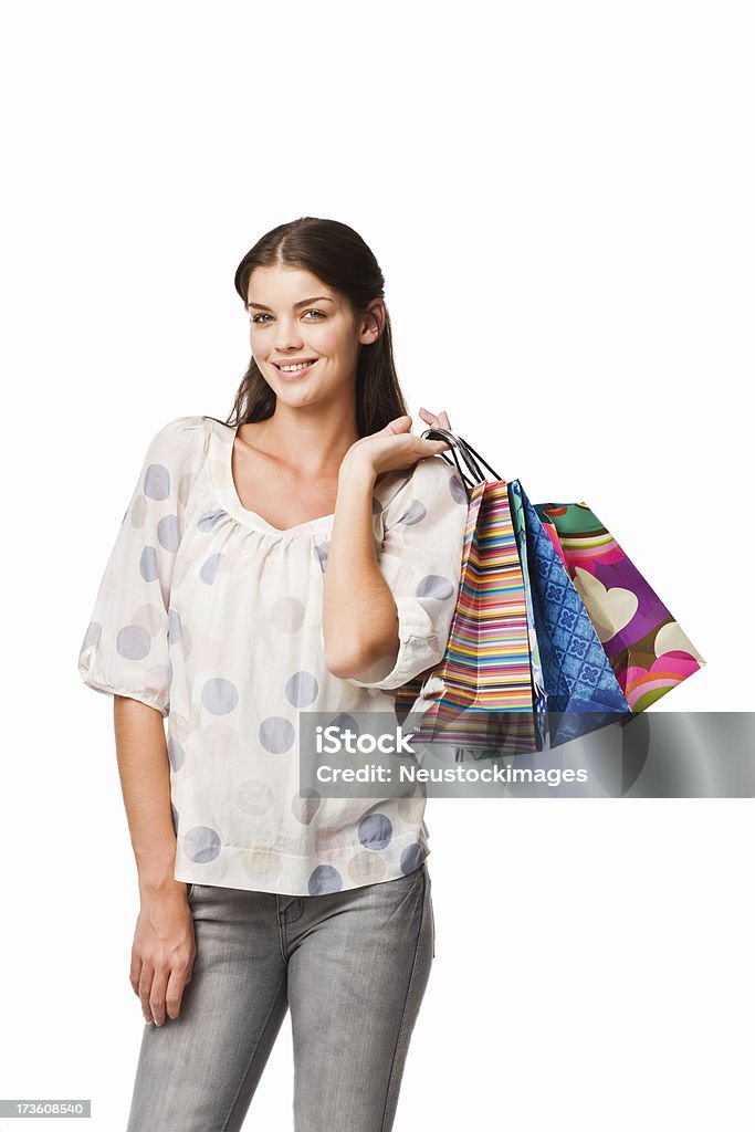 Jeune femme tenant shopping sacs - Photo de 20-24 ans libre de droits