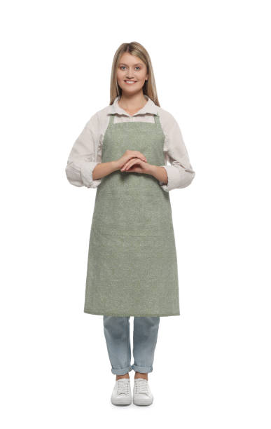 istock Beautiful young woman in clean apron on white background 1736096202