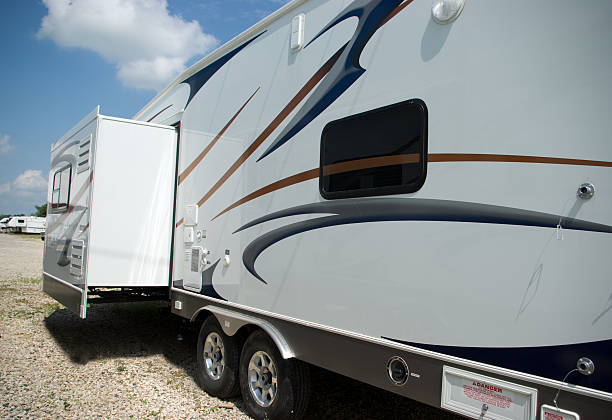 istock A large fifth wheel camping trailer with the bump out 173609836