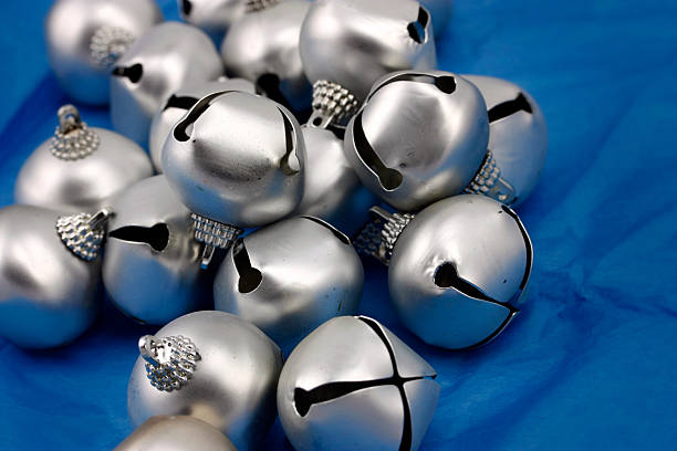 istock Silver Christmas bell Ornaments on blue background 173610356
