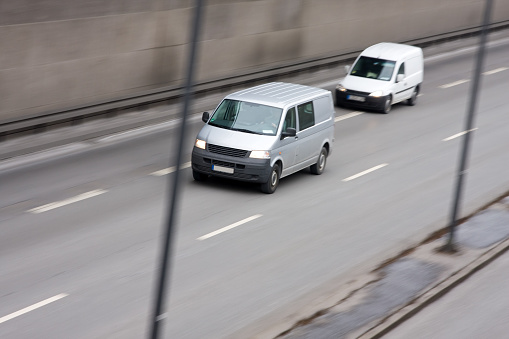 delivery van on highway, motion blur