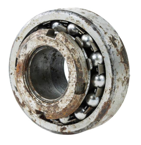 istock Bearing on a white background. Old worn bearing covered with rust 1736108133