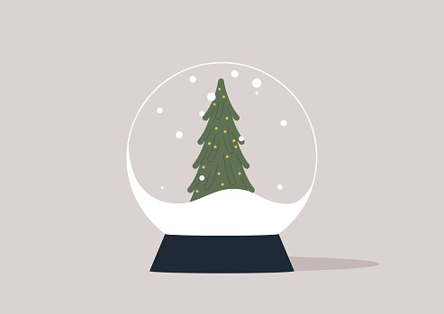 A crystal ball with a swirling snowstorm and a green xmas tree inside, serving as a symbol of the upcoming Christmas