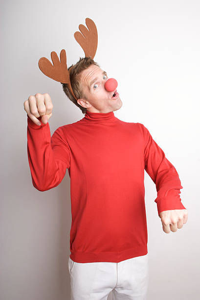 istock Red-Nosed Reindeer Holiday Man Paws the Air 173611013