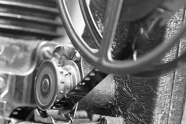 Black and white image of textile machine detail in manufacturing plant.