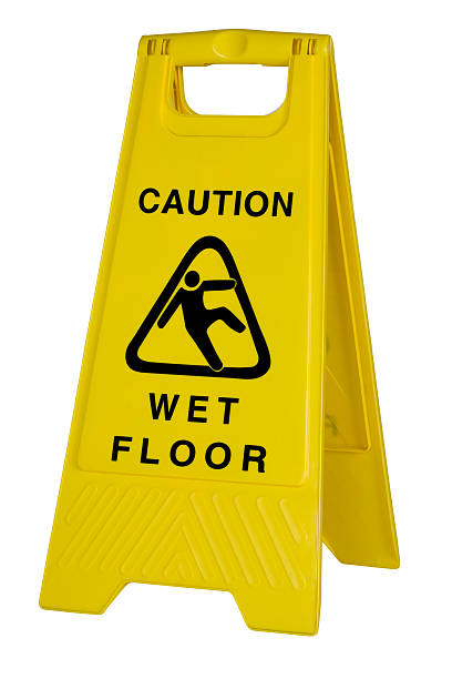 istock Yellow caution wet floor sign on white background 173612097