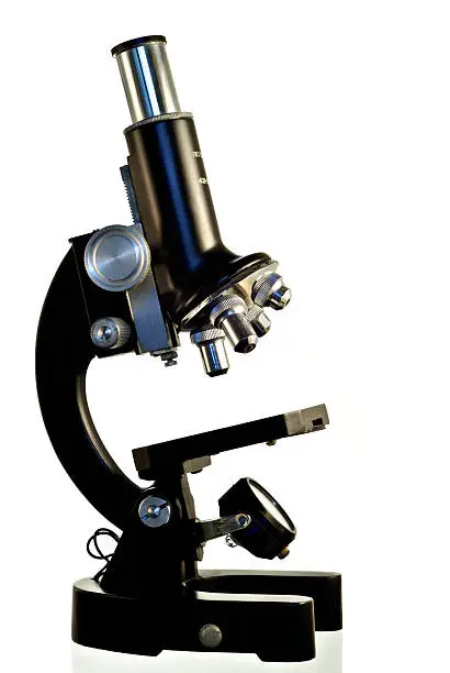 Photo of Black microscope on white background