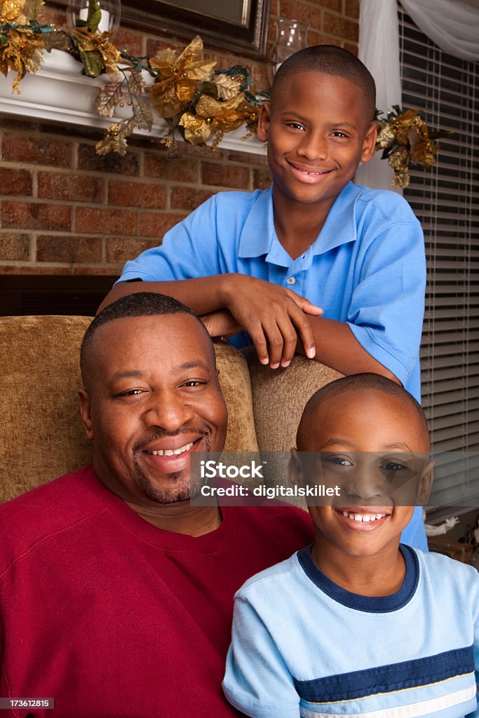 Father and his sons Boys Stock Photo