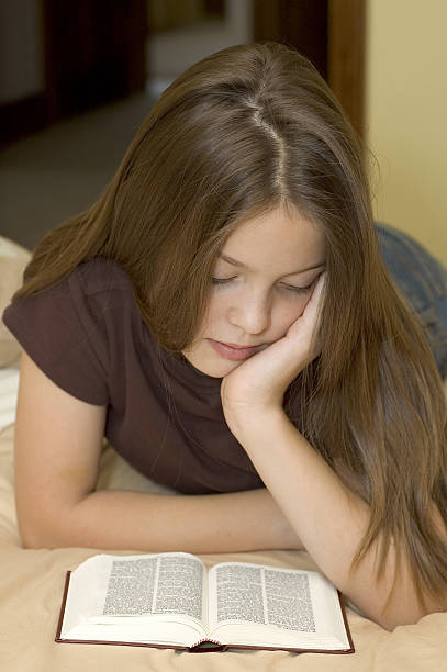 istock Bible Reading Girl 173613300