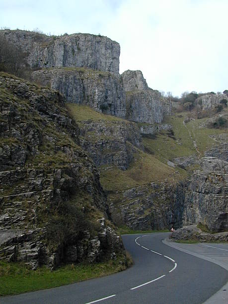 a winding road A road winding through Cheddar Gorge. cheddar gorge stock pictures, royalty-free photos & images