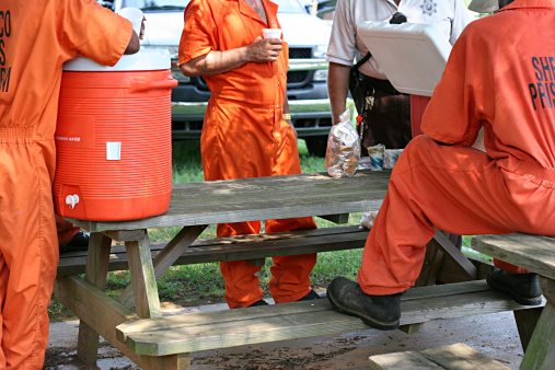 Inmates taking a break from community service work