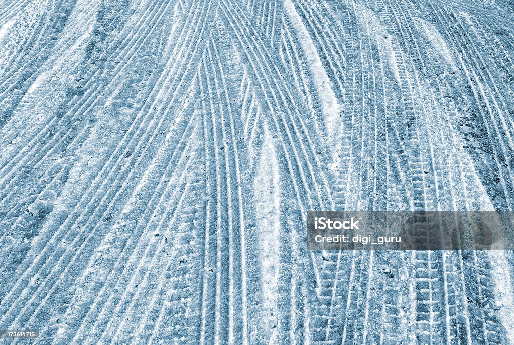 Heavy Snow Traffic Snow is patterned by the treads of passing cars with winter tires on a road in Canada. Snow Stock Photo