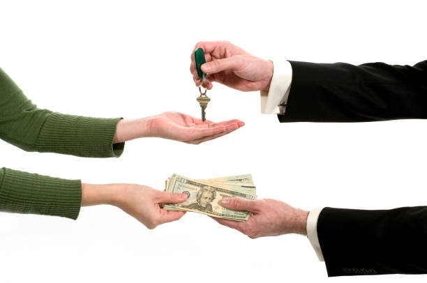 istock Business exchange with money and a key 173614821