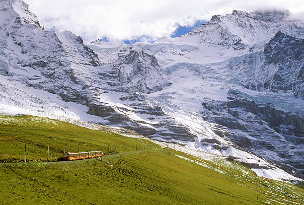 istock Train climbing toward mountains in Switzerland 173614932