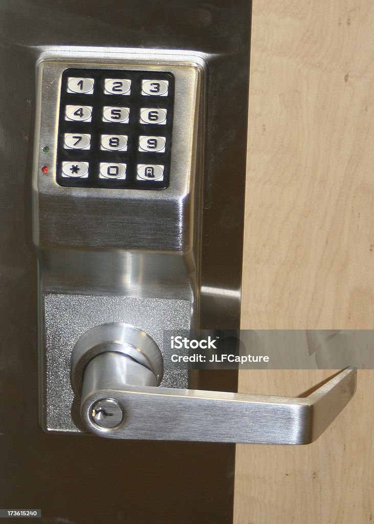 Number Coded Lock on Door for Security office door with combination safety lockPlease see some similar pictures from my portfolio: Business Stock Photo