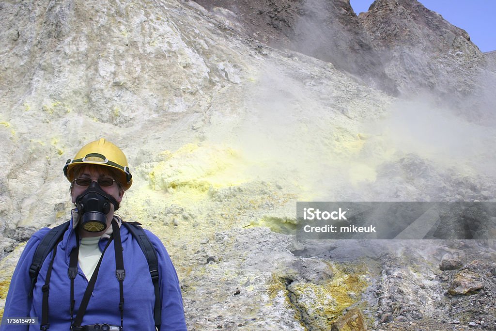 woman geologist on volcano geologist on volcano Adult Stock Photo