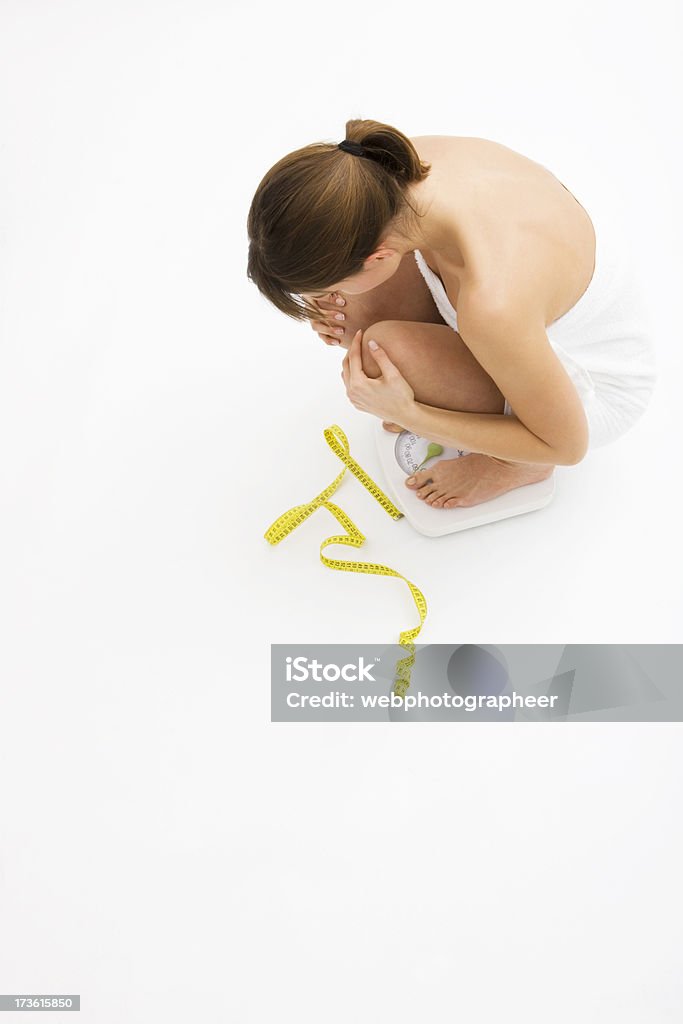 Mulher com escala - Foto de stock de Adulto royalty-free