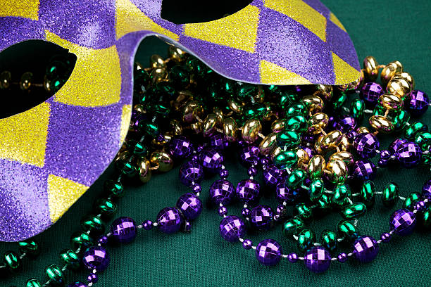istock Mardi Gras beads and mask 173615924