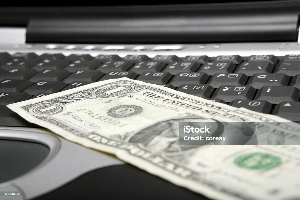 Dólar e laptop series - Foto de stock de Abundância royalty-free