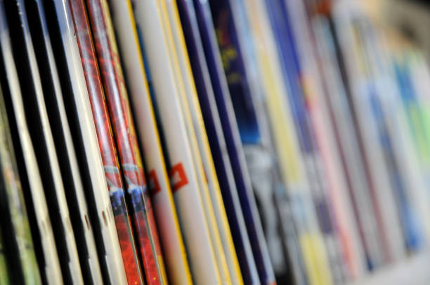istock A row of thin, staple-bound magazines in a kiosk 173616138