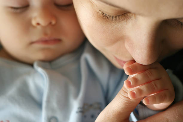 lulling the baby stock photo