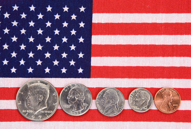 istock US Coins on America Flag 173616487