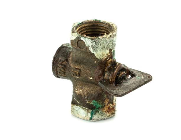 istock Old metal faucet on white background 1736168179