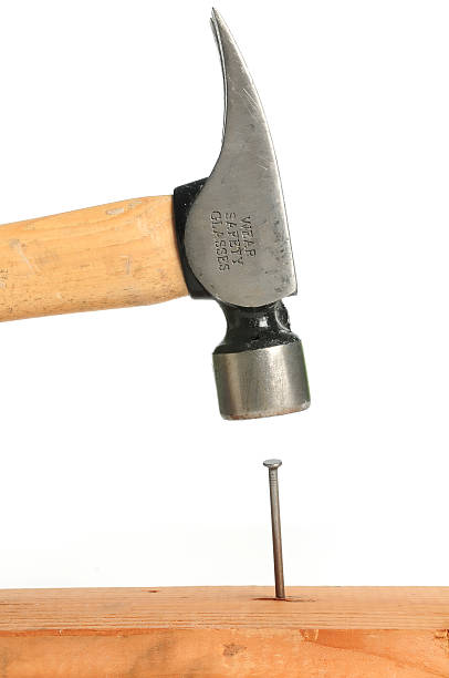 hammer and nail stock photo