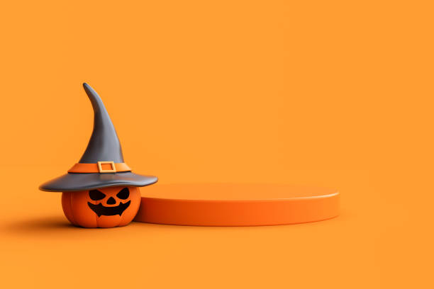 istock Jack-o-Lantern pumpkins wearing witch hat and podium for product display on orange background. 1736176576