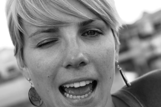 istock Winking woman closeup 173618306