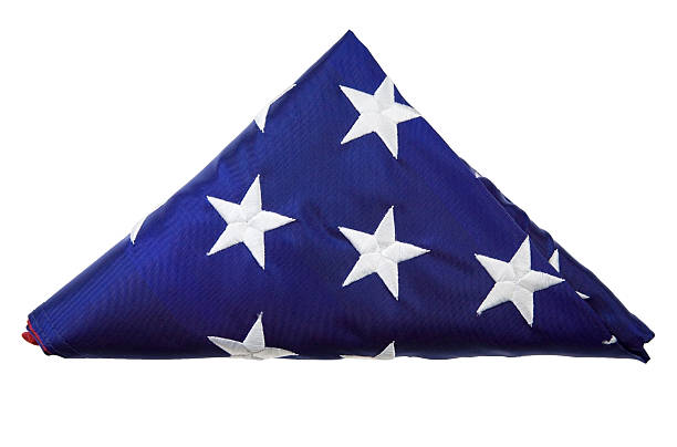американский флаг сложенный изолирован на белом - american flag folded usa flag стоковые фото и изображения