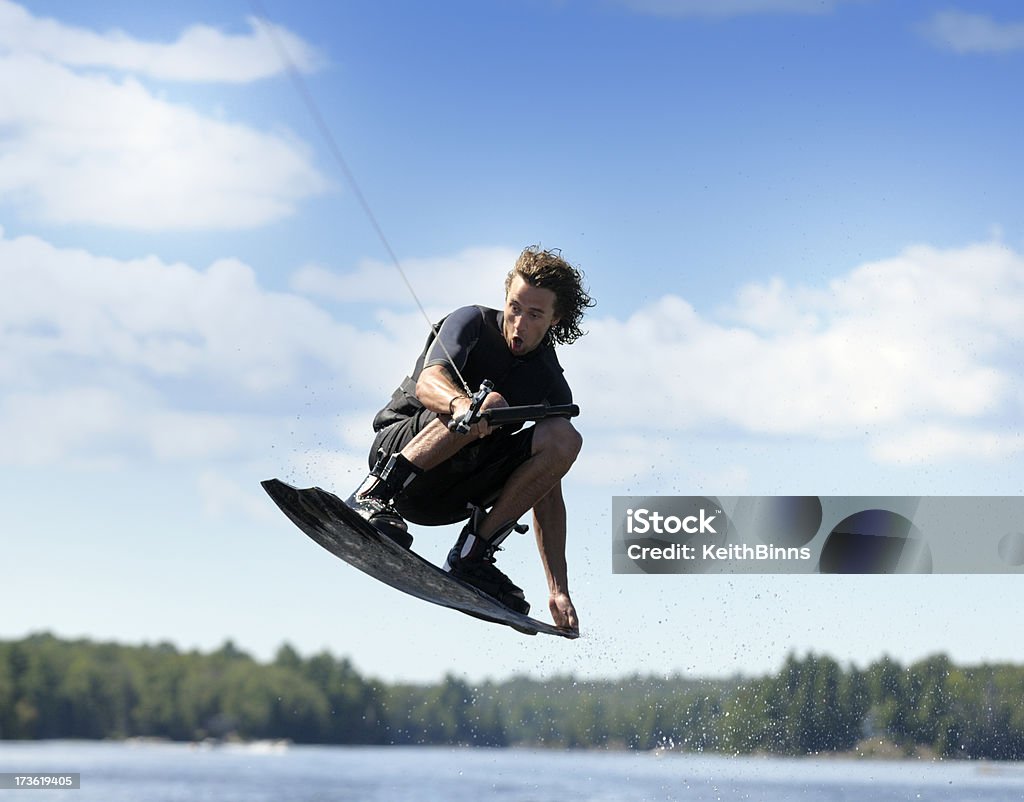 Tabla de surf - Foto de stock de Esquí acuático en tabla de surf libre de derechos